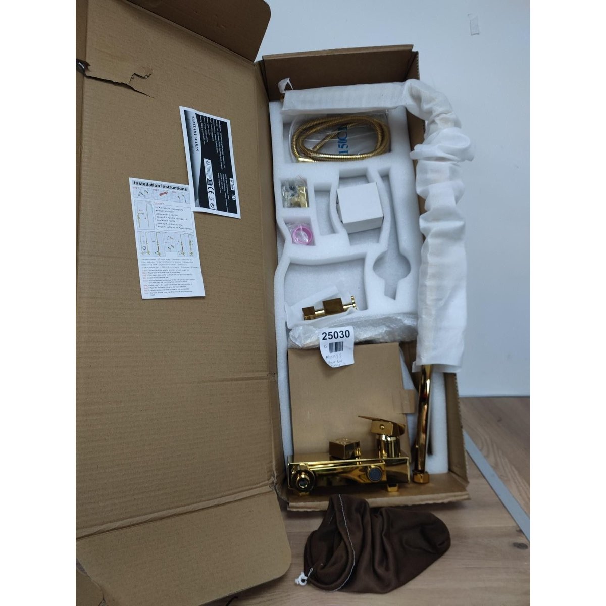 Gold-colored bathroom faucet