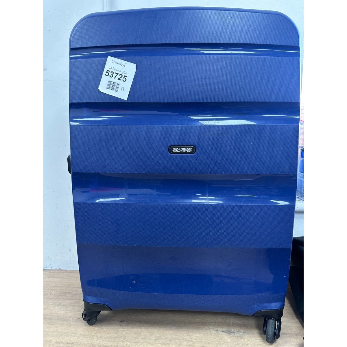 American Tourister- Spinner, Cabin Luggage- Scratched and unknown pin