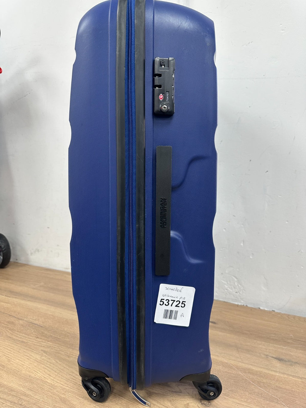 American Tourister- Spinner, Cabin Luggage- Scratched and unknown pin