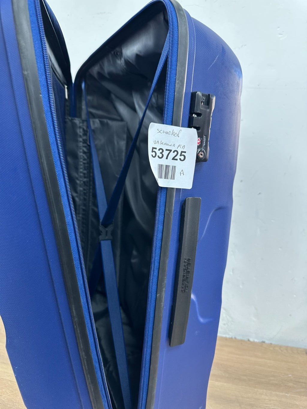 American Tourister- Spinner, Cabin Luggage- Scratched and unknown pin